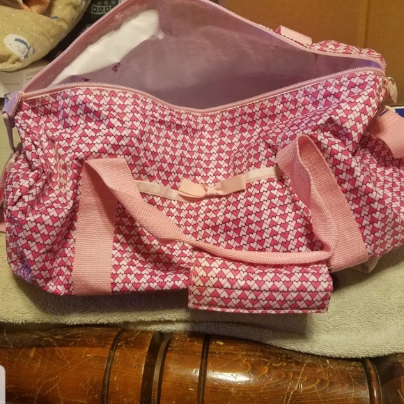 Avon Handbags - Pink heart duffle bag